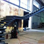 A Custom Fabricated Set Of Curved Architectural Stairs Under Construction