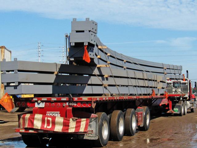 Rolled Structural Sections Stacked And Secured To A Truck For Shipping