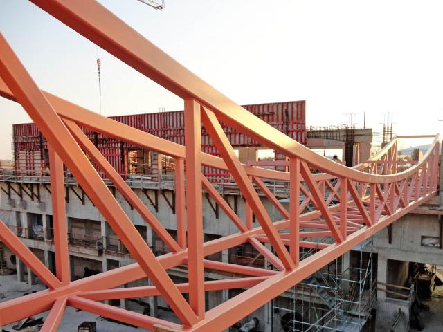 A Hollow Structural Steel Fabricated Assembly Being Installed At A Building Construction Site