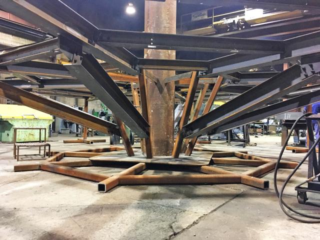 A Custom Fabricated Steel Support Platform Under Construction In A Workshop