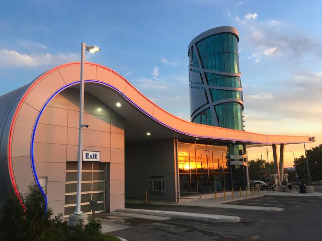 Sunset Reflects Off The Glass Of The Architecturally Exposed Structural Steel Of The Unipetro Station In Brampton