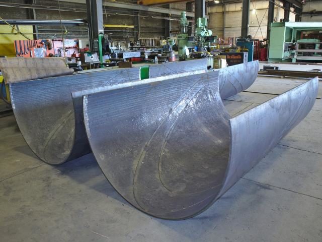 Sections Of Sheet Steel Custom Formed Into Half Sections Of Electrical Transmission Towers