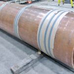 A 17' Long Section Of Heavy Copper Plate Is Custom Formed Into A Cylinder