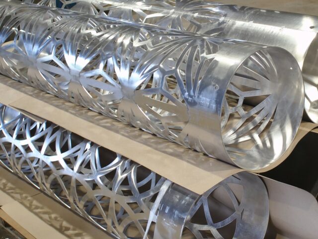 A Set Of Custom Rolled Aluminum Architectural Columns