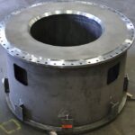 A Custom Fabricated Industrial Cylinder With An Internal Cone And Connecting Flange