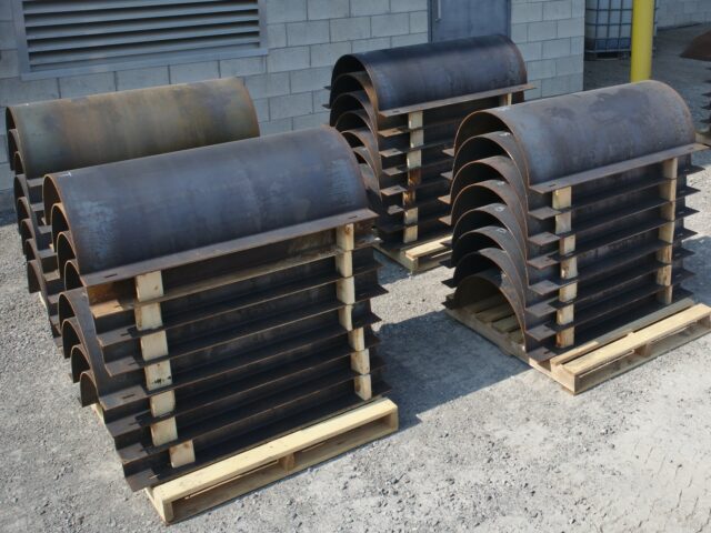 Custom Fabricated Underground Pipe Casing Sections Formed From Sheet Steel Sit Packed For Shipping At Kubes Steel
