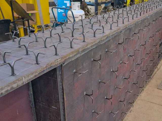 A Custom Fabricated Beam With Refractory Anchors